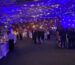 Guests gathered around chef-attended stations at a Bay Area corporate holiday party catered by PSRT